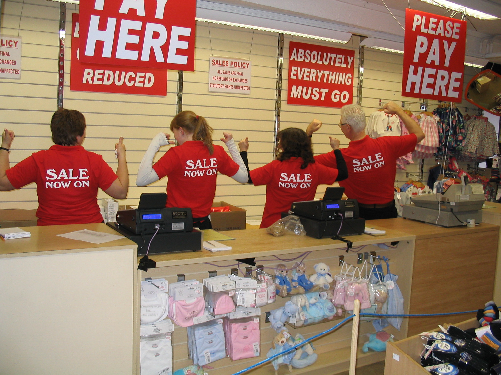 Barsleys staff wearing Sale Now On shirts during the 2014 refurbishment sale
