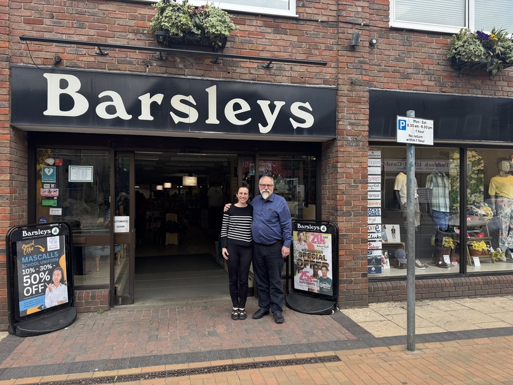 Barsleys Department Store in Paddock Wood, with Richard and Alice outside the shop